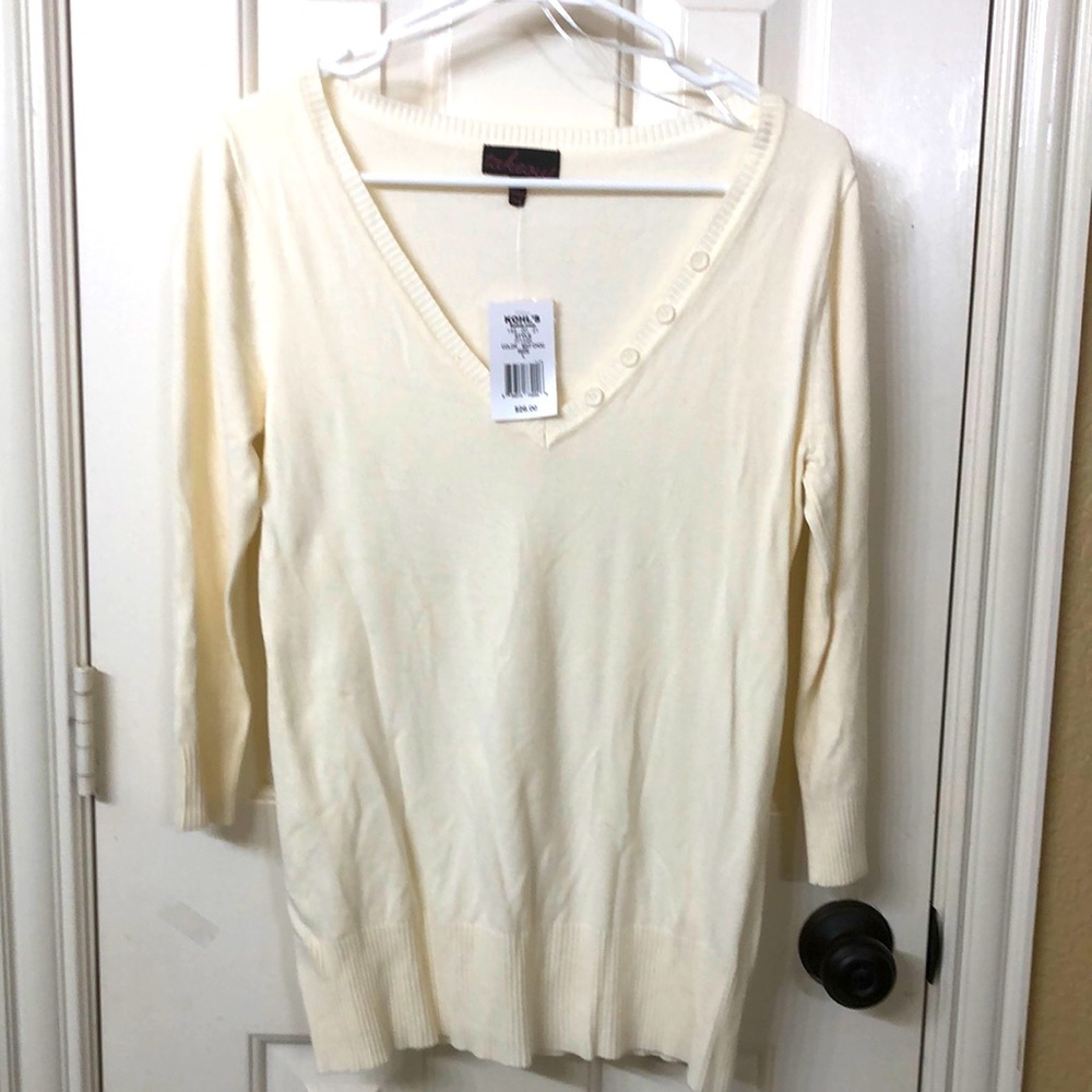 Cream colored light v neck sweater